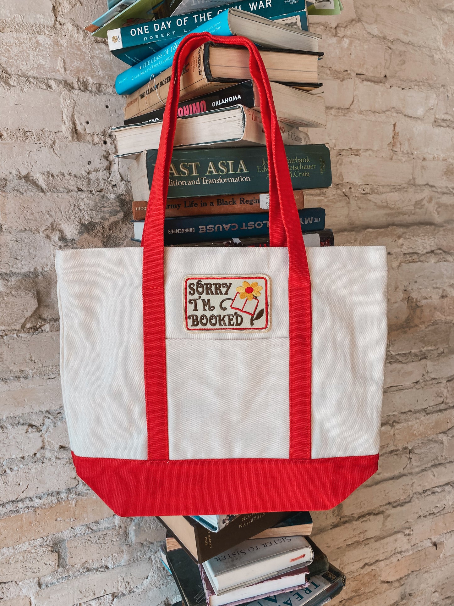 Sorry I’m Booked (red tote bag)