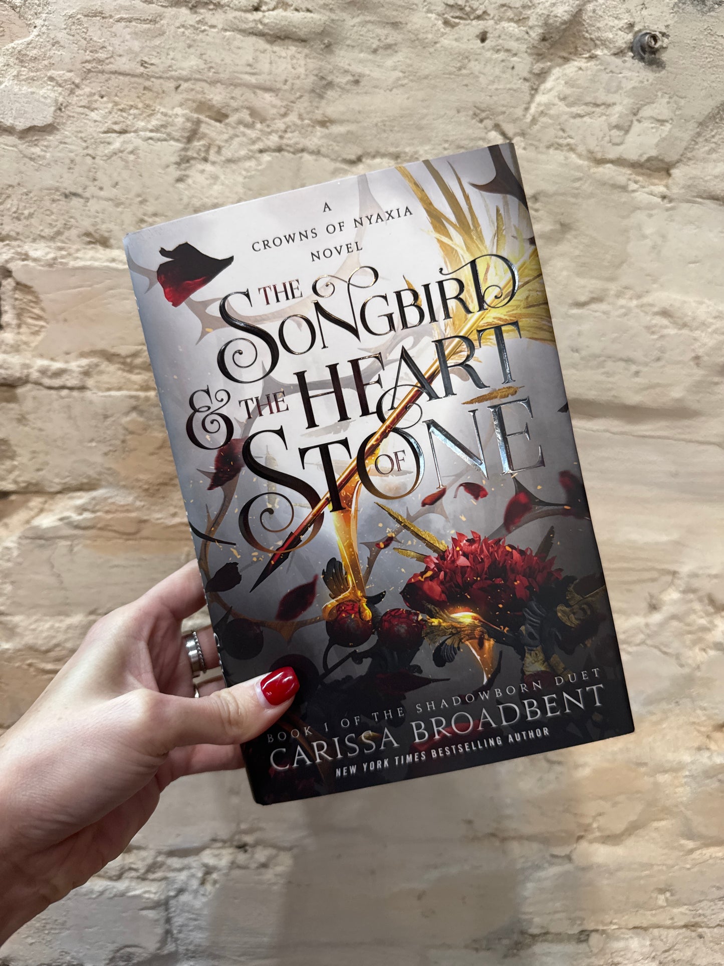 The Songbird & The Heart of Stone: Crowns Of Nyaxia #1