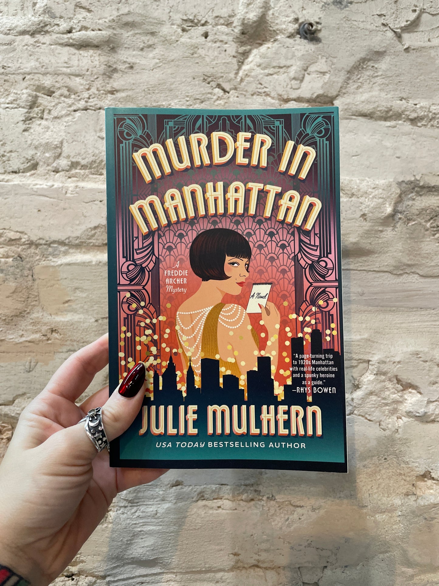 Murder in Manhattan by Julie Mulhern