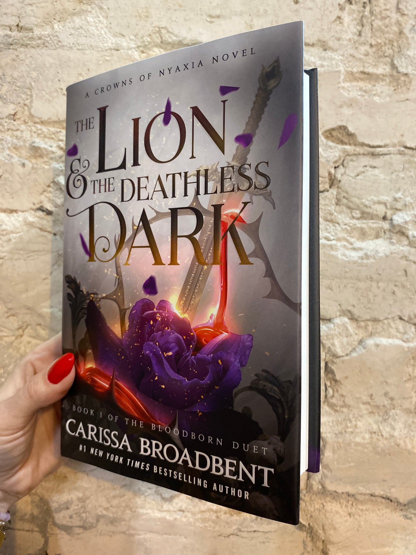 The Lion and the Deathless Dark by Carissa Broadbent (Book 5)
