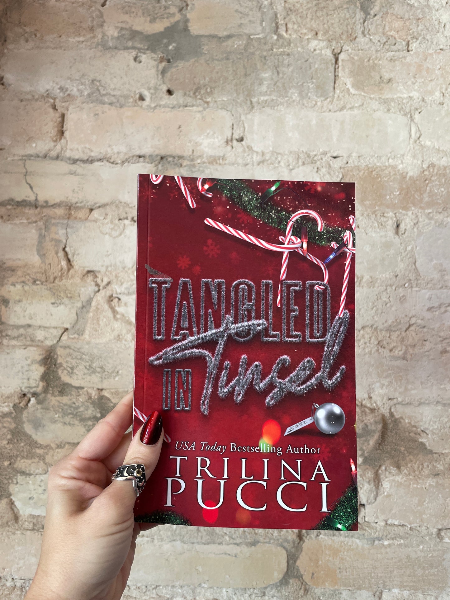 Tangled in Tinsel by Trilina Pucci