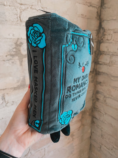 “My Dark Romances Do Things Real Men Never Could” book plushie