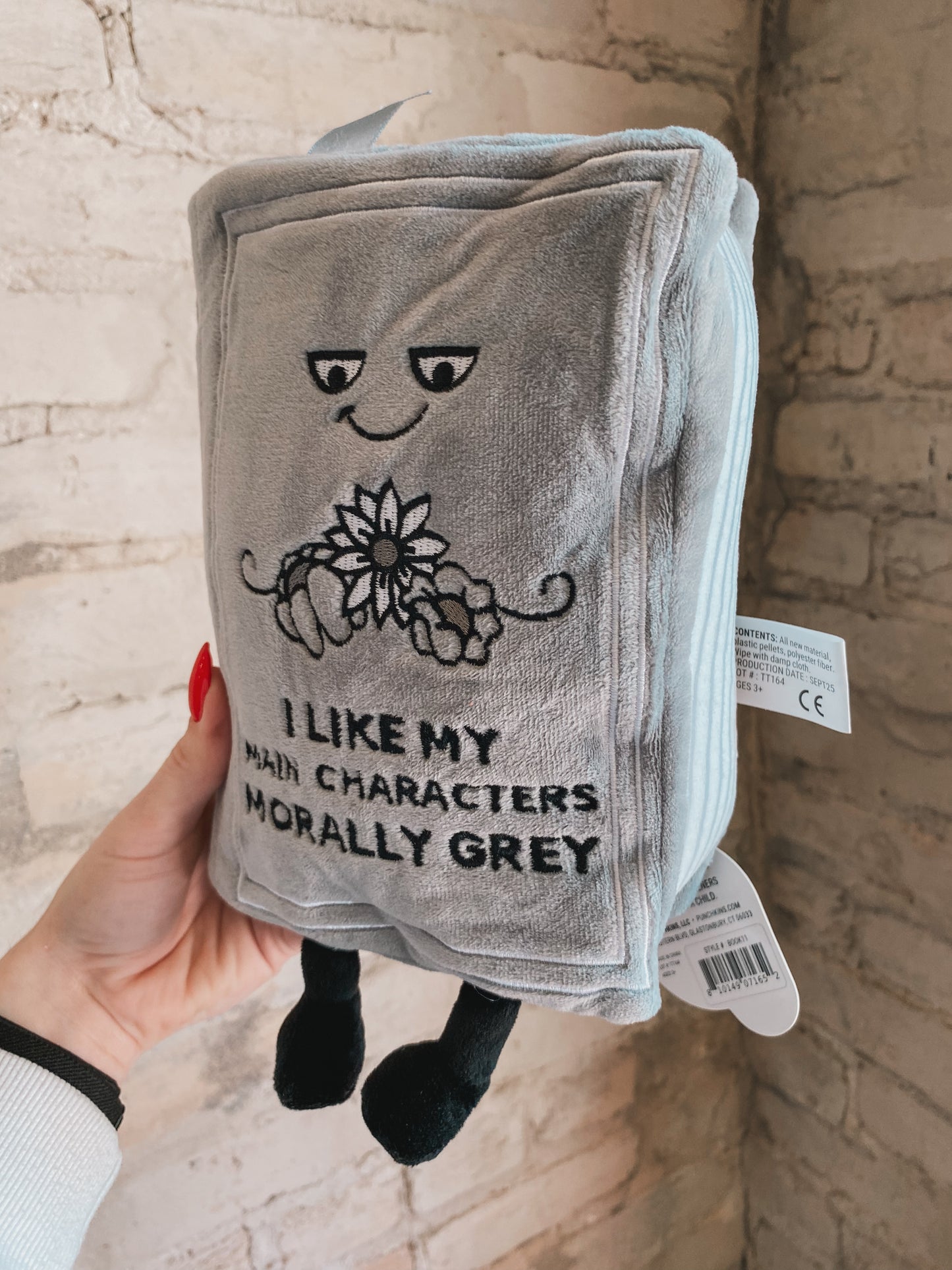 “I Like Main Characters Morally Grey” book plushie