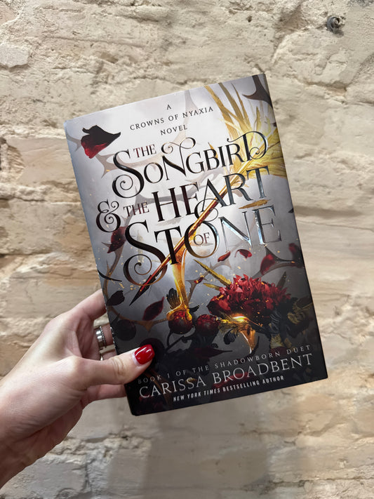The Songbird & The Heart of Stone: Crowns Of Nyaxia #1