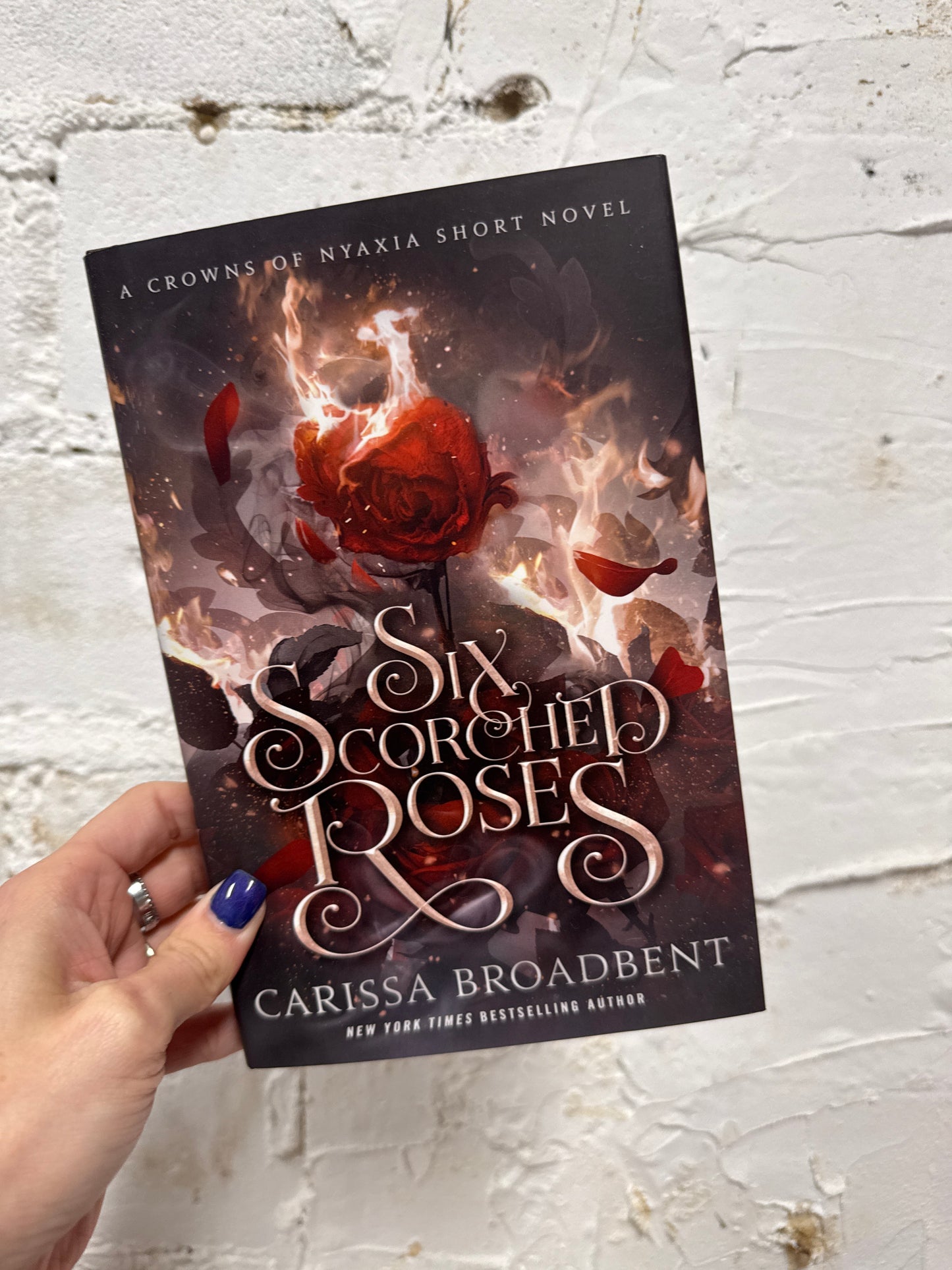 Six Scorched Roses by Carissa Broadbent