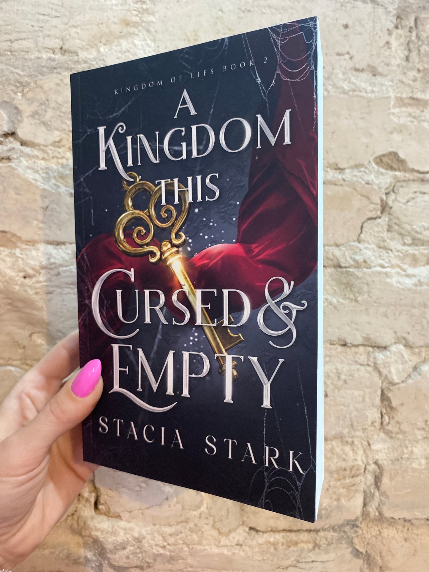 A Kingdom This Cursed and Empty by Stacia Stark (Book 2)