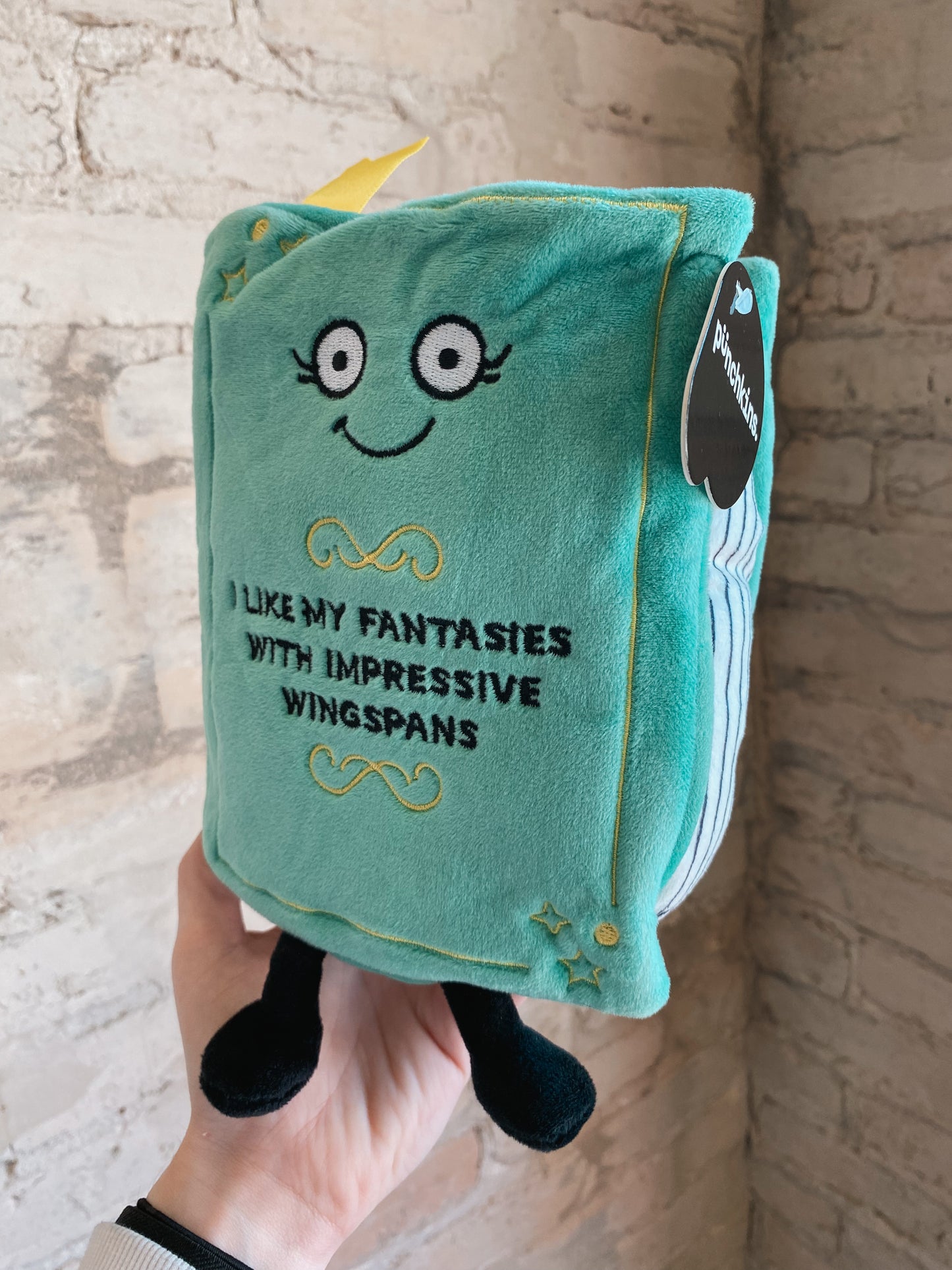 “I Like My Fantasies With Impressive Wingspans” book plushie