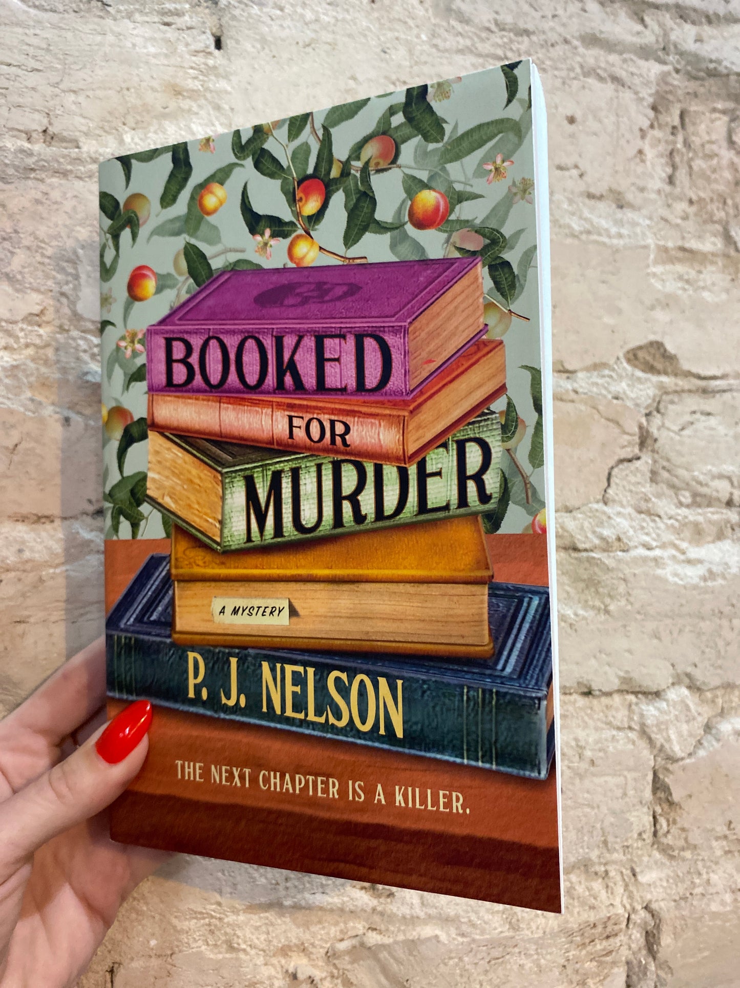 Booked for Murder by P.J. Nelson